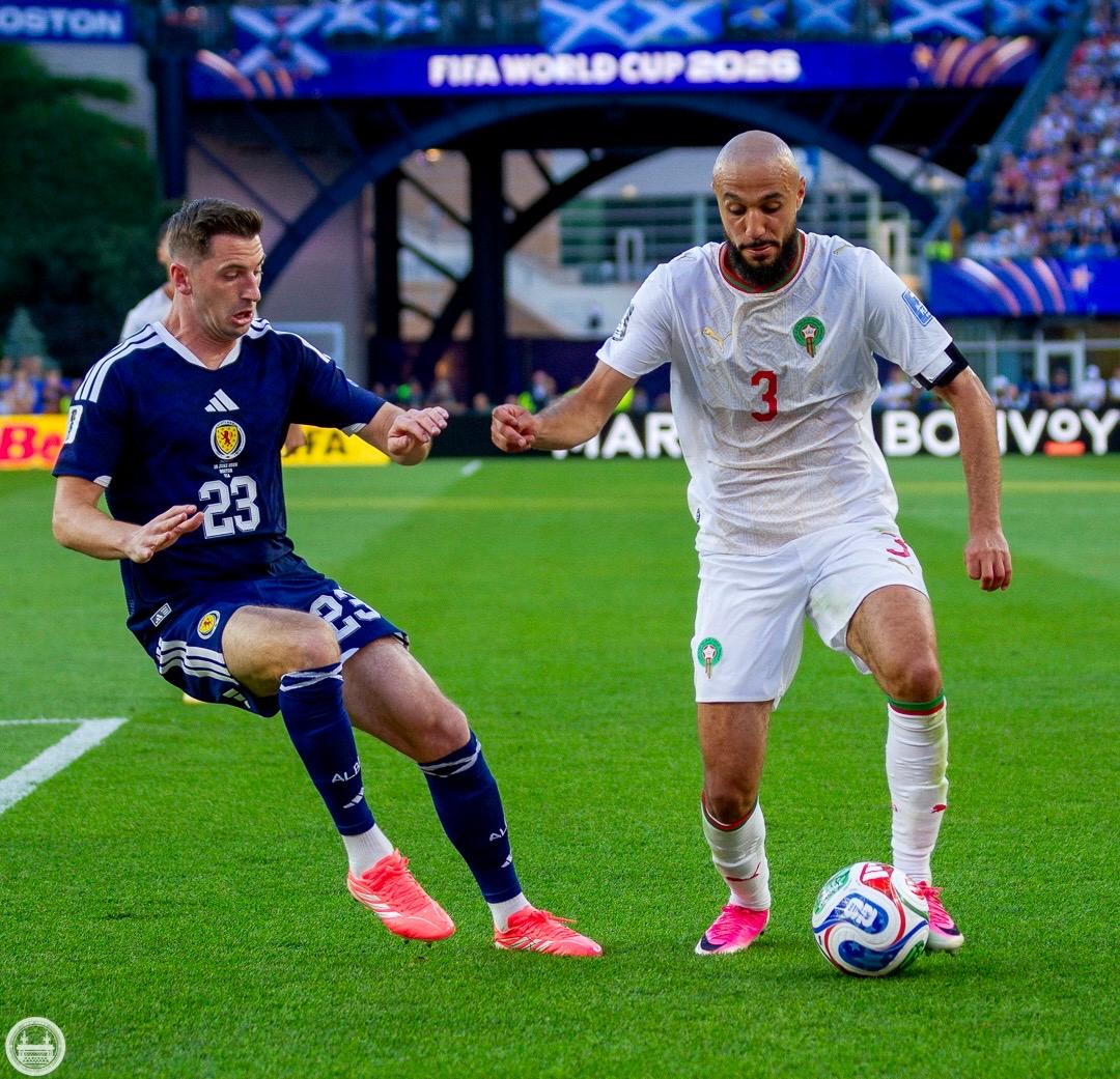 Noussair Mazraoui dribbling for Morocco against Scotland