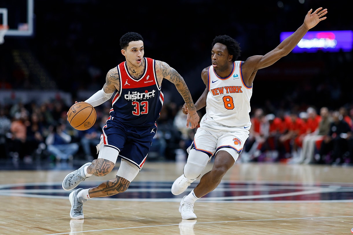 Washington Wizards forward Kyle Kuzma (33) drives to the basket as New York Knicks forward OG Anunoby (8) defends in the third quarter at Capital One Arena