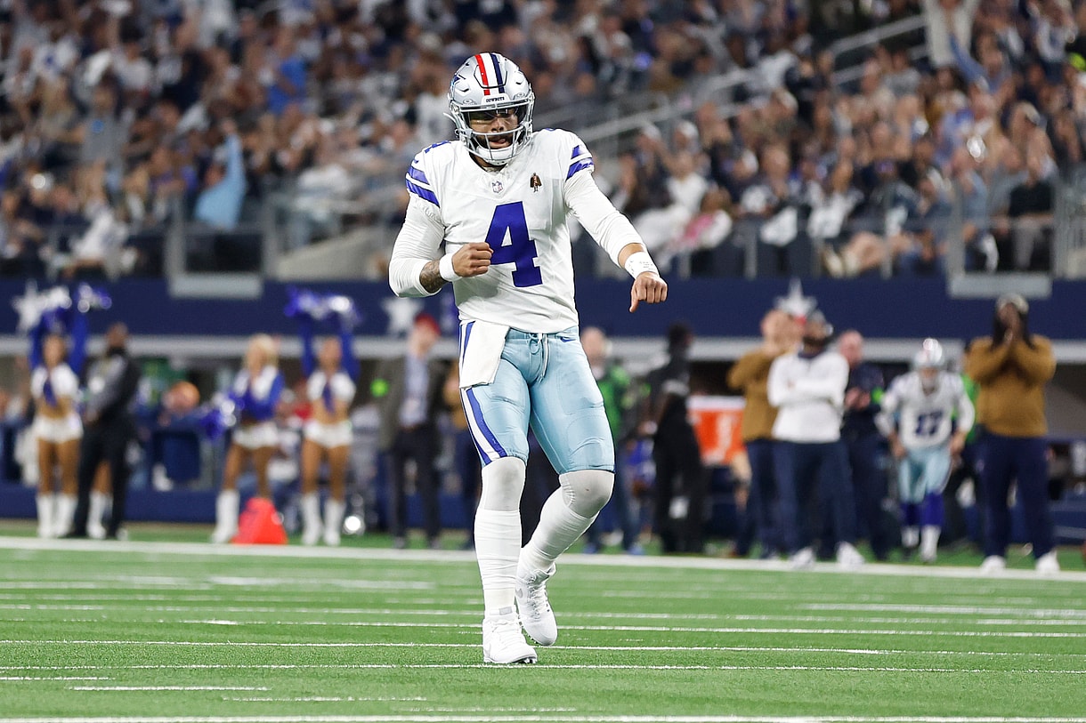 Nov 12, 2023; Arlington, Texas, USA; Dallas Cowboys quarterback Dak Prescott (4) reacts after throwing a touchdown pass in the second quarter against the New York Giants at AT&T Stadium. Mandatory Credit: Tim Heitman-USA TODAY Sports