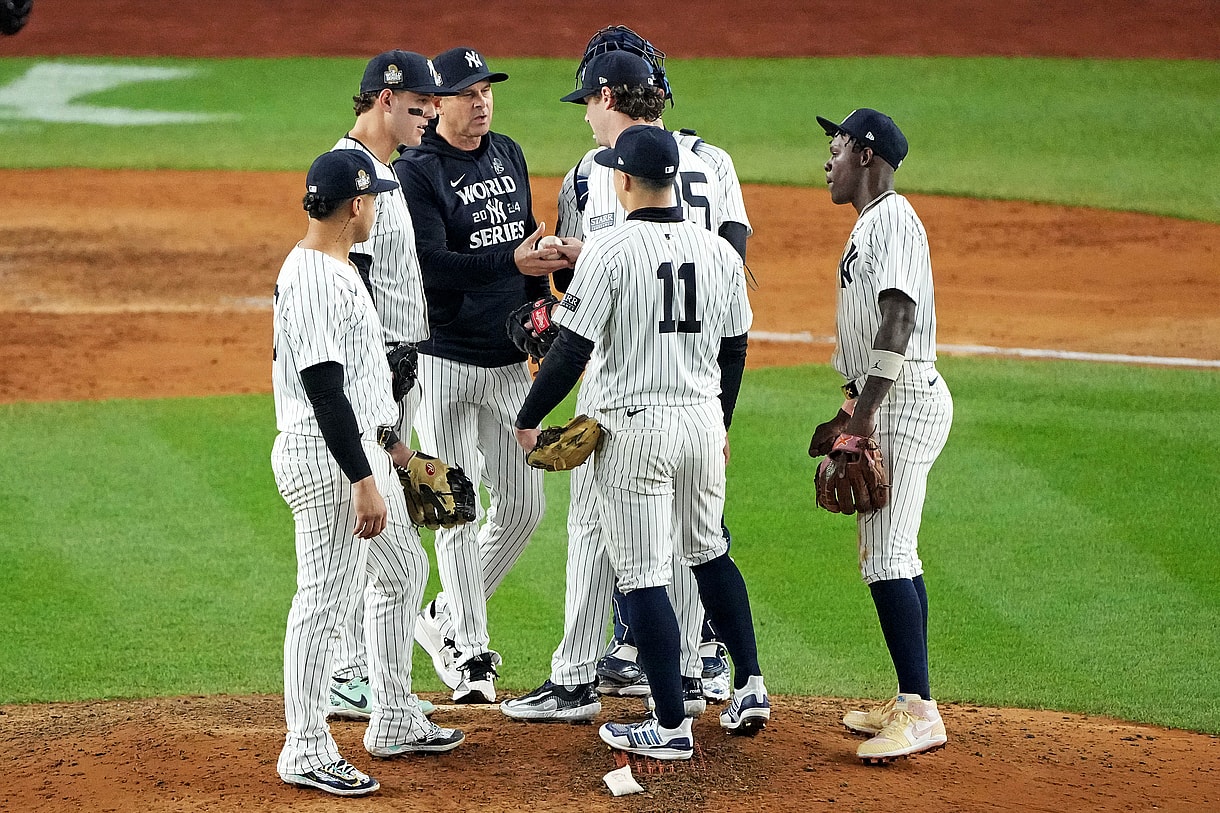 Oct 30, 2024; New York, New York, USA; New York Yankees manager Aaron Boone (17) relieves pitcher Gerrit Cole (45) during the seventh inning against the Los Angeles Dodgers in game four of the 2024 MLB World Series at Yankee Stadium. Mandatory Credit: Robert Deutsch-Imagn Images