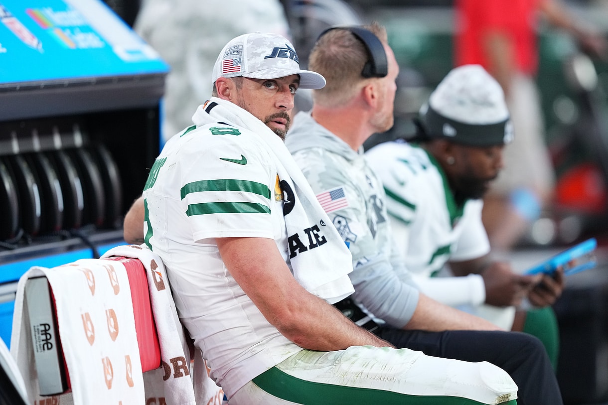 Nov 10, 2024; Glendale, Arizona, USA; New York Jets quarterback Aaron Rodgers (8) looks on against the Arizona Cardinals during the second half at State Farm Stadium. Mandatory Credit: Joe Camporeale-Imagn Images