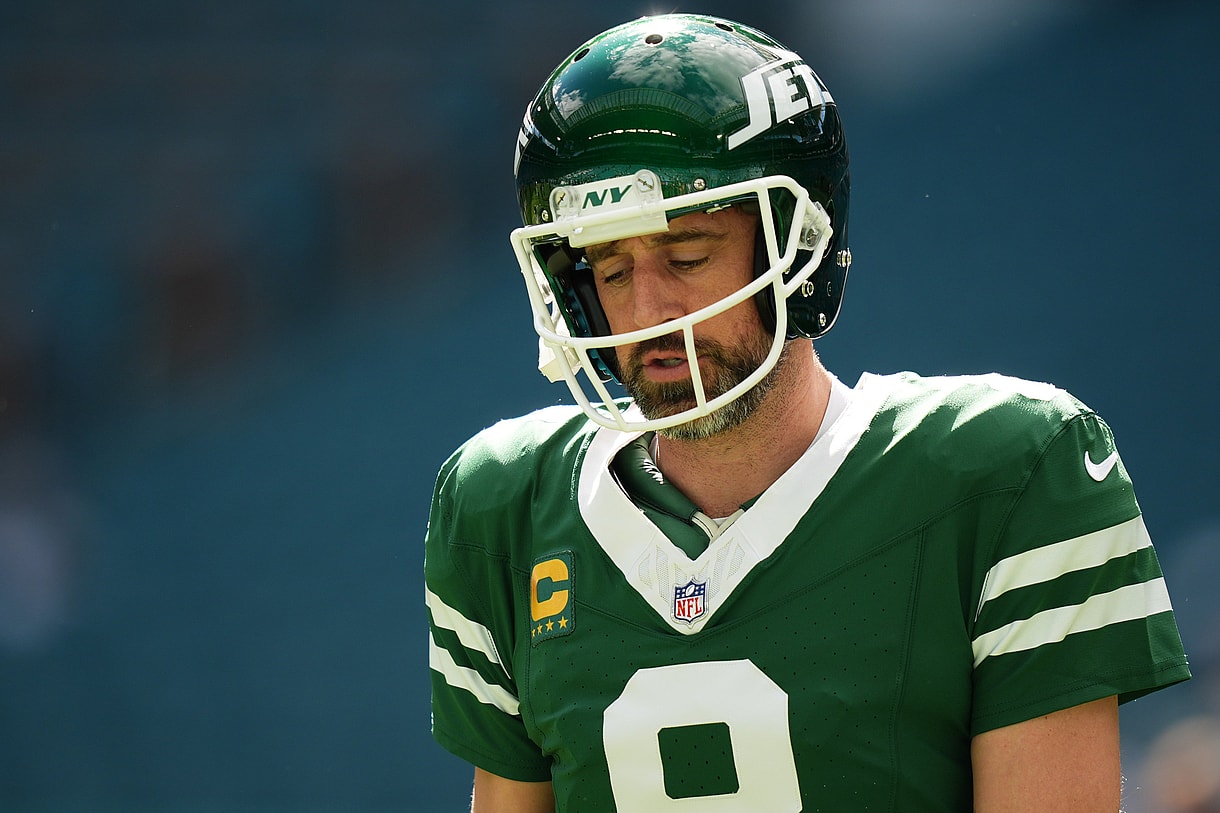 Dec 8, 2024; Miami Gardens, Florida, USA; New York Jets quarterback Aaron Rodgers (8) warms up prior to the game against the Miami Dolphins at Hard Rock Stadium. Mandatory Credit: Jasen Vinlove-Imagn Images