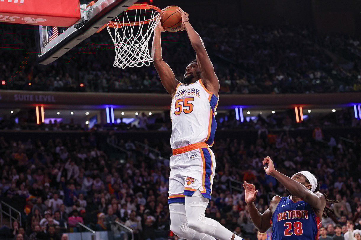 Dec 7, 2024; New York, New York, USA; New York Knicks center Ariel Hukporti (55) dunks during the second half against the Detroit Pistons at Madison Square Garden. Mandatory Credit: Vincent Carchietta-Imagn Images