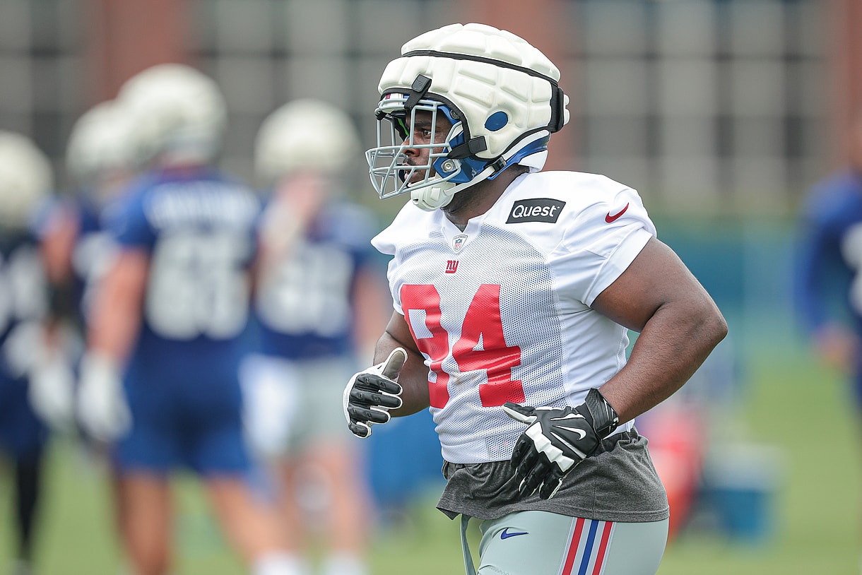 Jul 24, 2024; East Rutherford, NJ, USA; New York Giants defensive tackle Elijah Chatman (94) runs on the field during training camp at Quest Diagnostics Training Facility. Mandatory Credit: Vincent Carchietta-USA TODAY Sports