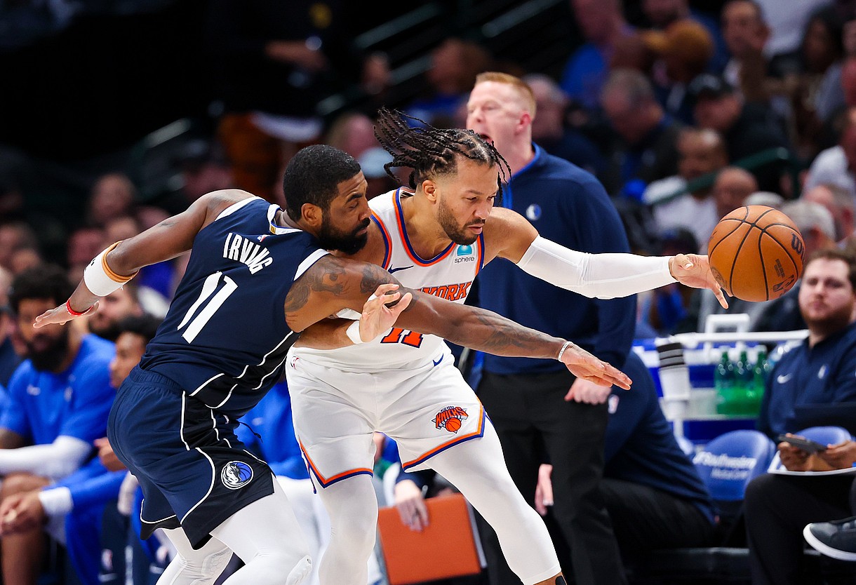 Jan 11, 2024; Dallas, Texas, USA; Dallas Mavericks guard Kyrie Irving (11) knocks the ball away from New York Knicks guard Jalen Brunson (11) during the second half at American Airlines Center. Mandatory Credit: Kevin Jairaj-USA TODAY Sports