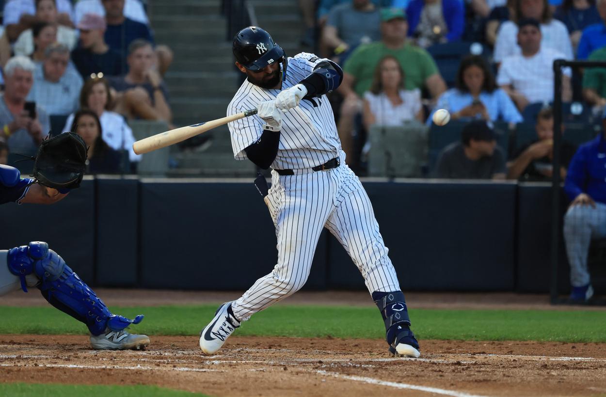 Ali Sanchez singles for the Yankees during spring training against Toronto