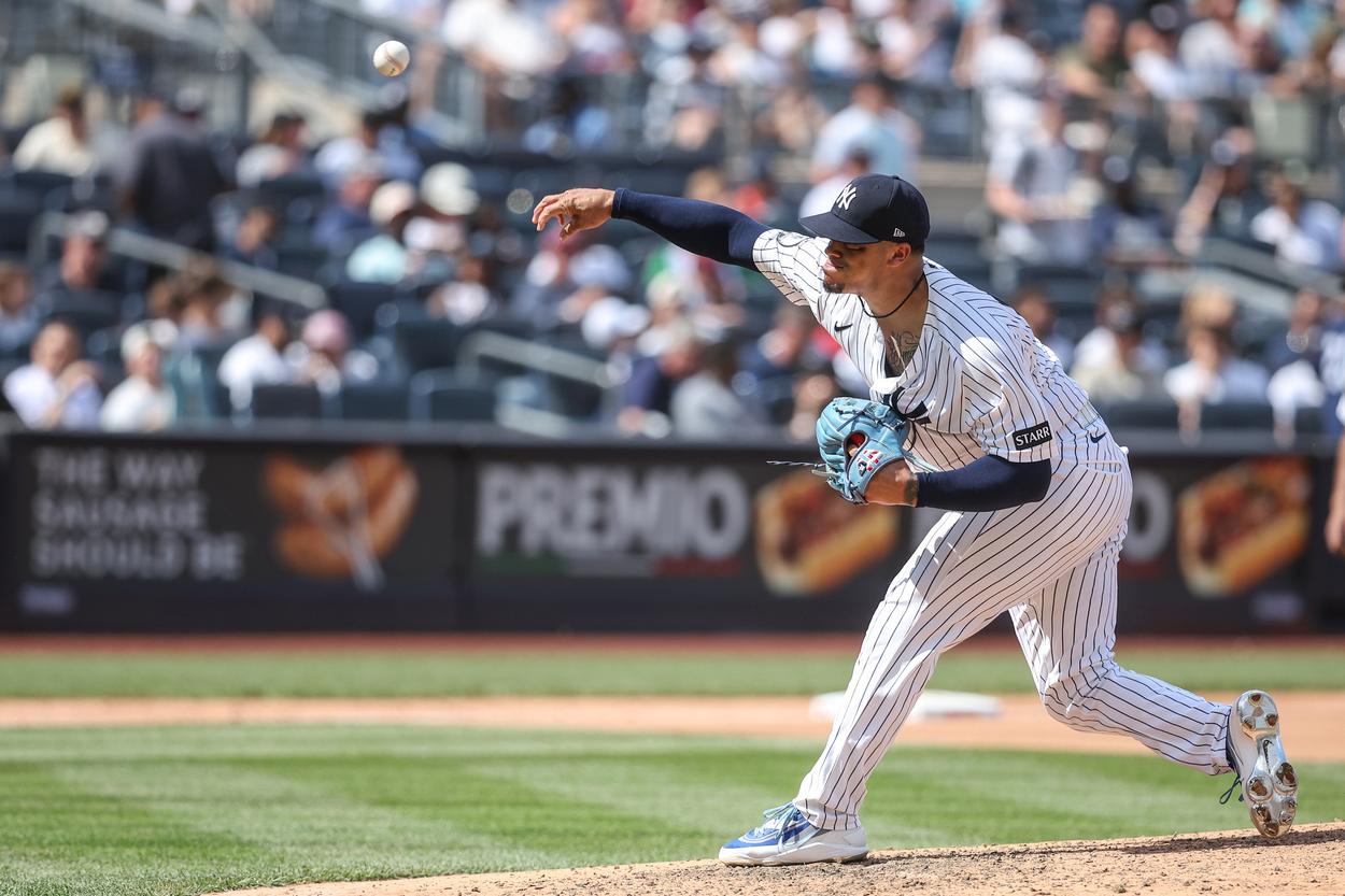 Fernando Cruz pitches for the Yankees against Boston