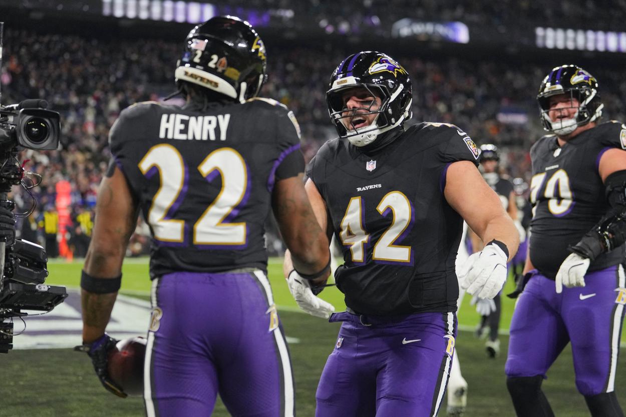 Patrick Ricard congratulates Derrick Henry after a Ravens touchdown