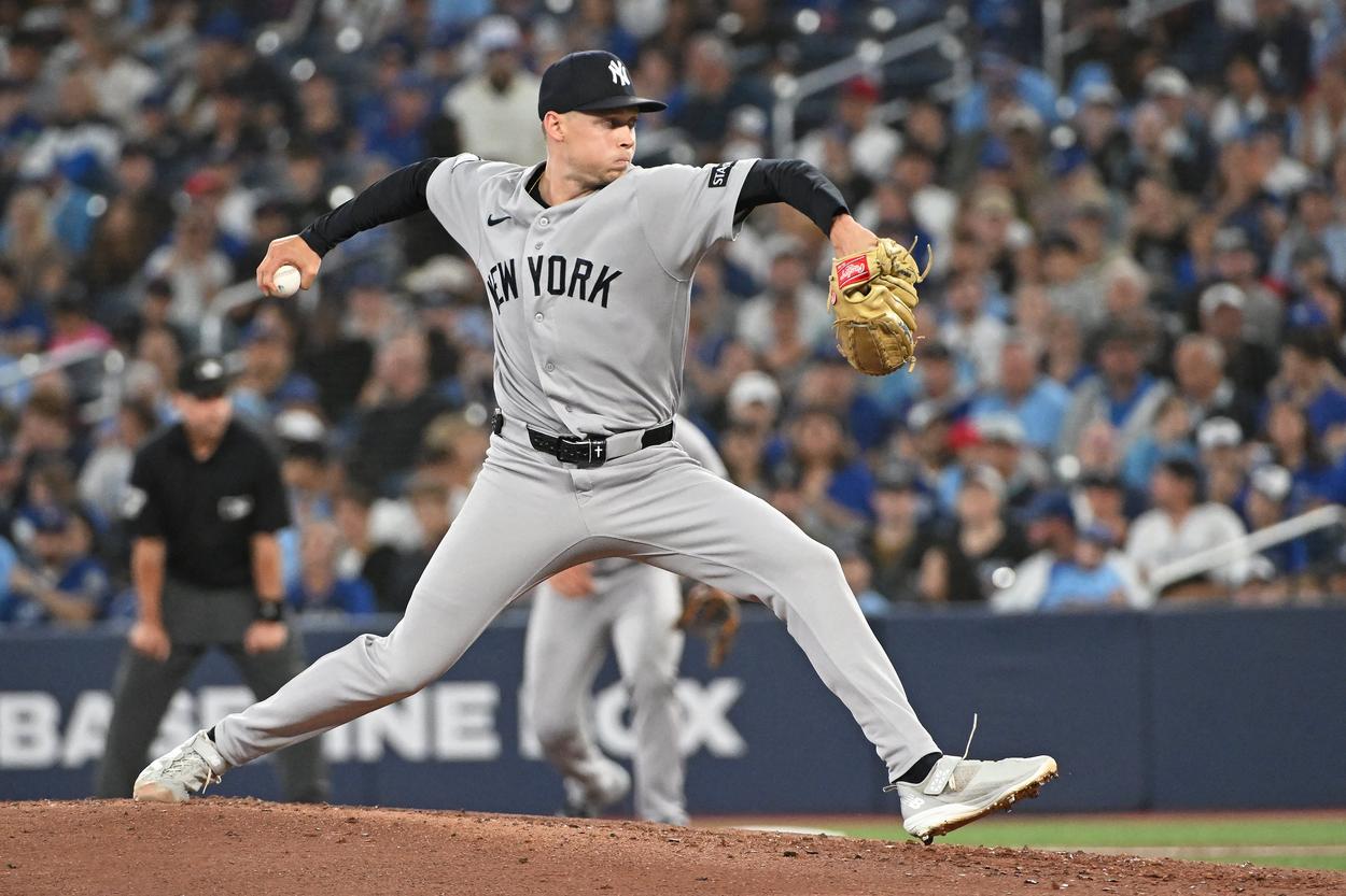Will Warren pitching for the Yankees during a game