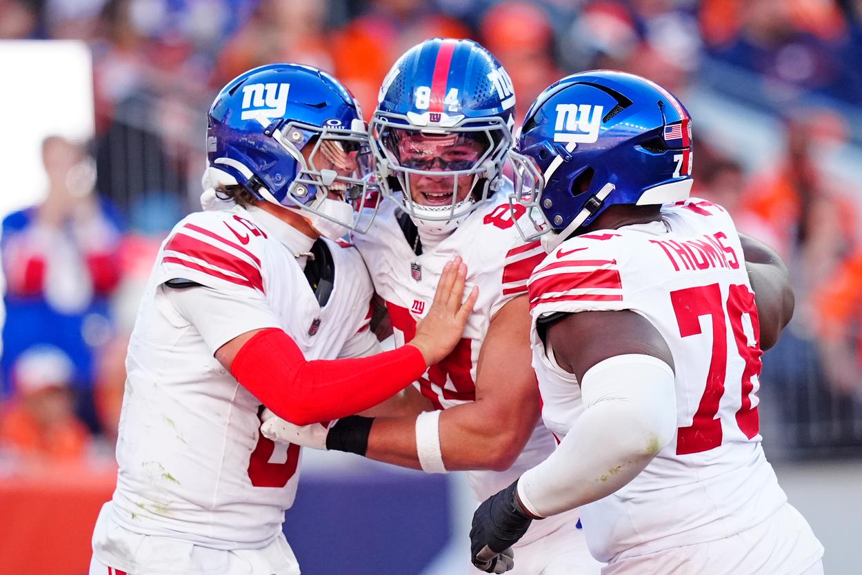 Theo Johnson catching a pass for the Giants
