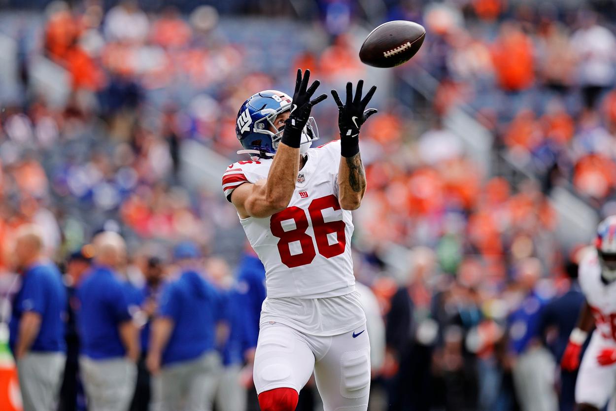 Thomas Fidone warming up before a Giants game