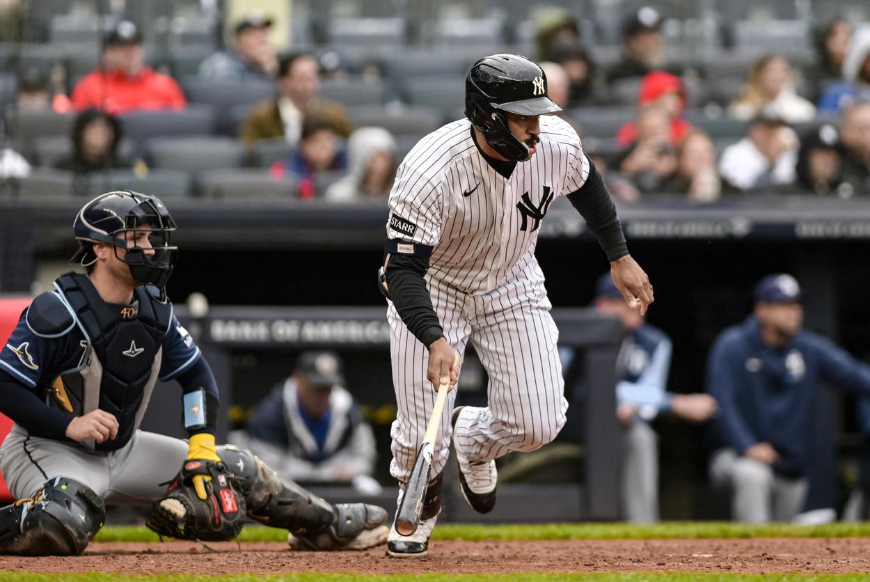Trent Grisham hits a single for the Yankees against the Rays