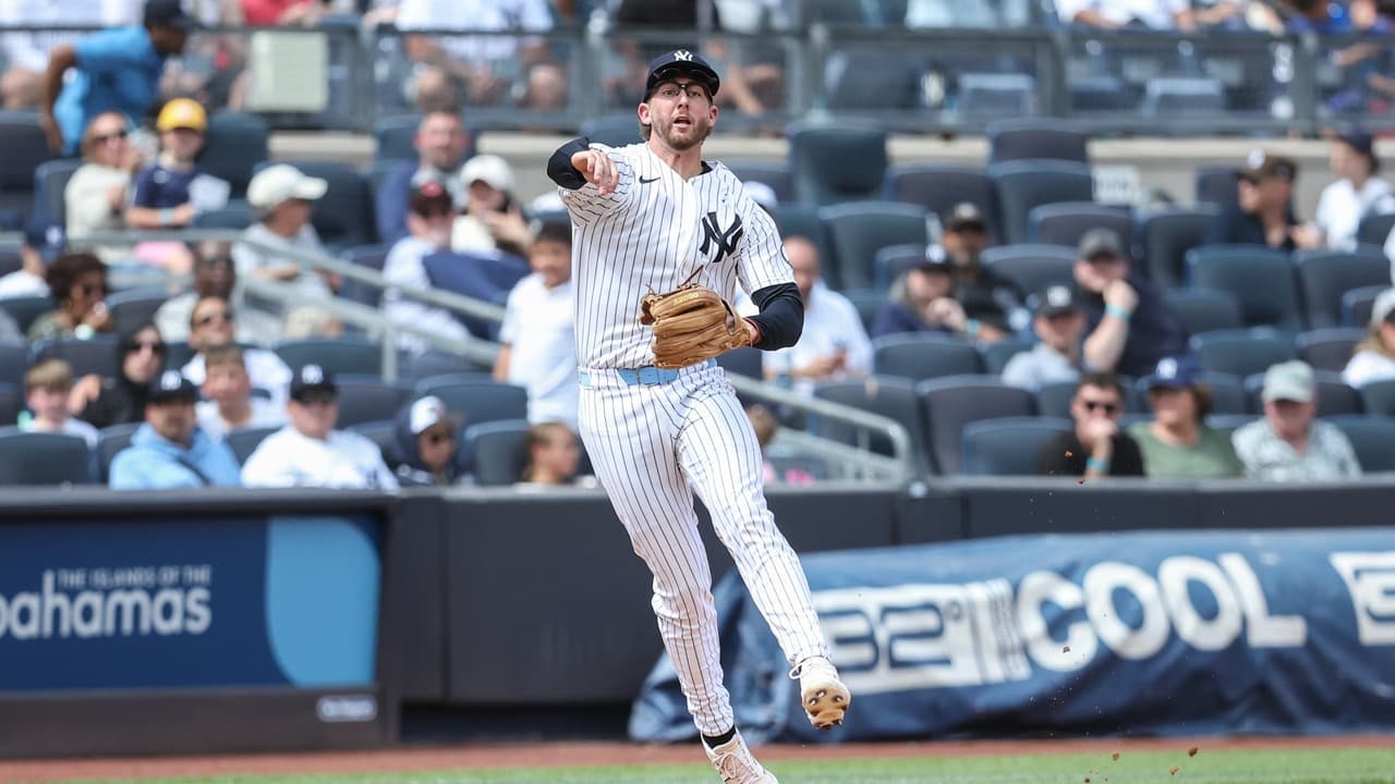 Ryan McMahon making a throw from third base for the Yankees