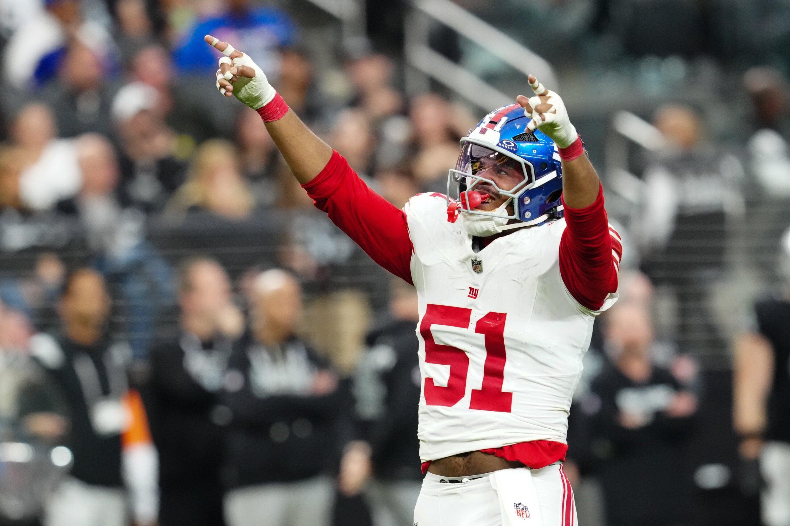 Abdul Carter and Brian Burns during a Giants game