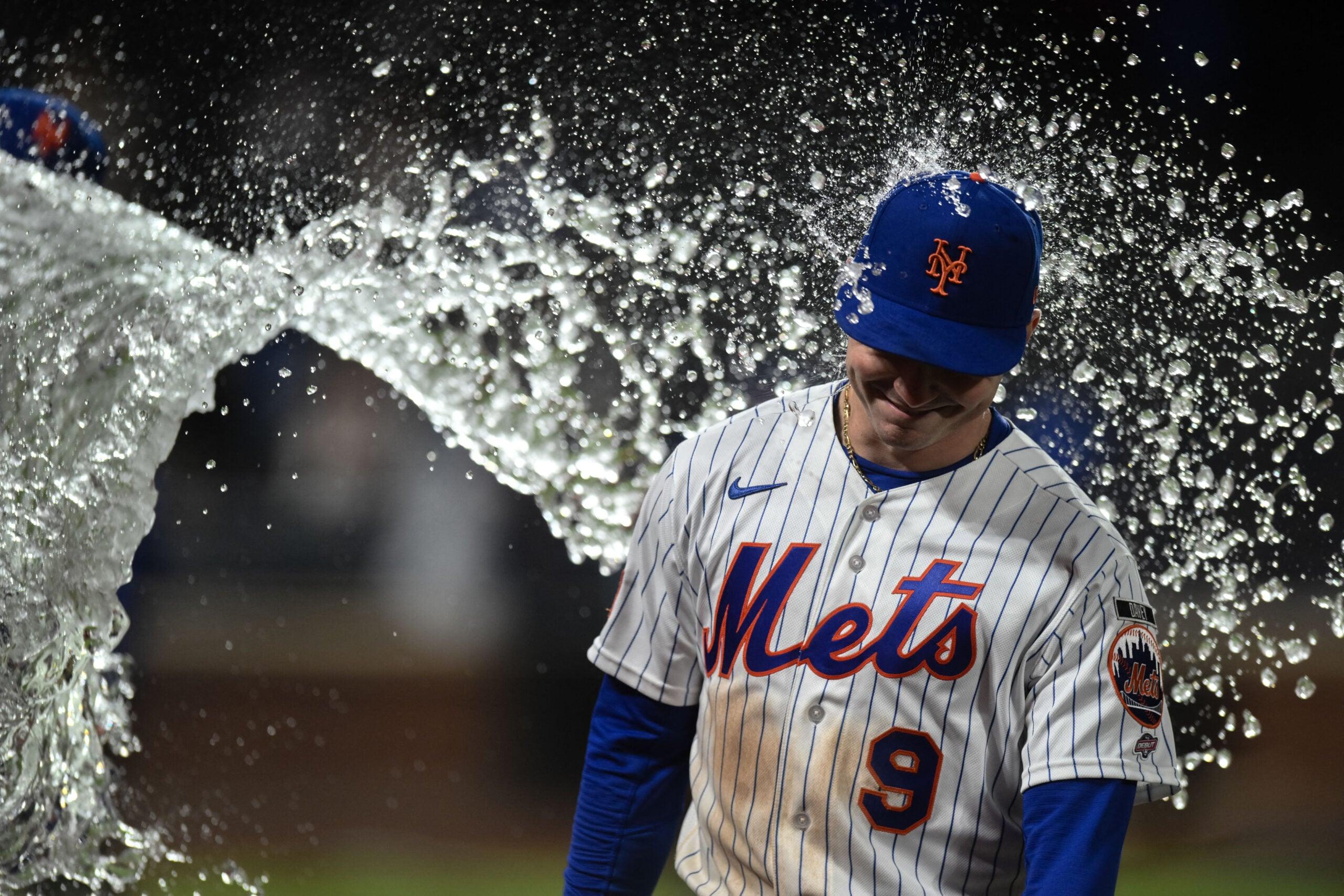 A.J. Ewing celebrates with the Mets after a strong game
