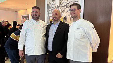 Yankees' Executive Chef Robert Flowers (left) and Yankees' Executive Sous Chef Nicholas Karoly (right) pose for photo at Yankees Sampling Event