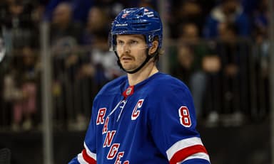 Nov 25, 2024; New York, New York, USA; New York Rangers defenseman Jacob Trouba (8) skates against the St. Louis Blues during the first period at Madison Square Garden. Mandatory Credit: Danny Wild-Imagn Images