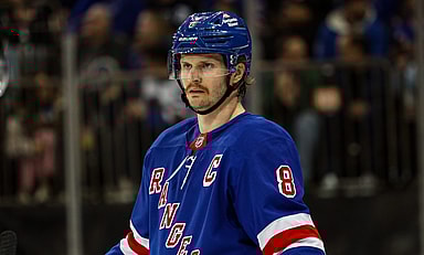 Nov 25, 2024; New York, New York, USA; New York Rangers defenseman Jacob Trouba (8) skates against the St. Louis Blues during the first period at Madison Square Garden. Mandatory Credit: Danny Wild-Imagn Images