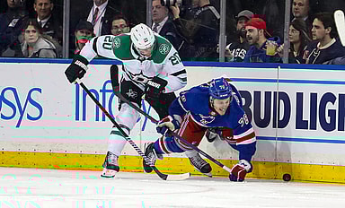 Jan 12, 2023; New York, New York, USA; Dallas Stars defenseman Ryan Suter (20) and New York Rangers center Jonny Brodzinski (76) battle for the puck during the third period at Madison Square Garden. Mandatory Credit: Danny Wild-USA TODAY Sports