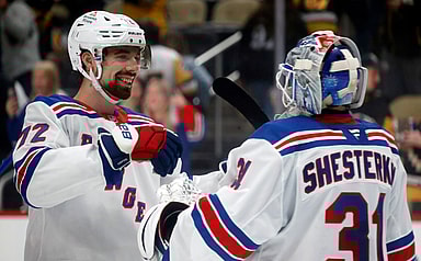 Oct 9, 2024; Pittsburgh, Pennsylvania, USA;  New York Rangers center Filip Chytil (72) and goaltender Igor Shesterkin (31) celebrate after defeating the Pittsburgh Penguins at PPG Paints Arena. Mandatory Credit: Charles LeClaire-Imagn Images