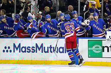 New York Rangers center Mika Zibanejad (93) celebrates with teammates after scoring a goal against the New Jersey Devils during the second period in game six of the first round of the 2023 Stanley Cup Playoffs at Madison Square Garden