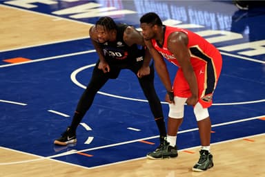 New York Knicks forward Julius Randle (30) and New Orleans Pelicans forward Zion Williamson (1) react during a break in game action during the second half against the New Orleans Pelicans at Madison Square Garden