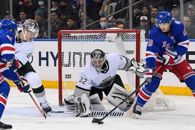 New York Rangers center Ryan Strome (16) plays with the puck in front of Los Angeles Kings goaltender Jonathan Quick (32) during the third period at Madison Square Garden