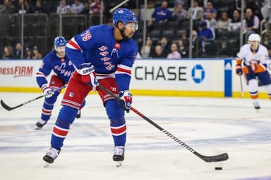 New York Rangers defenseman K'Andre Miller (79) controls the puck in the first period against the New York Islanders at Madison Square Garden