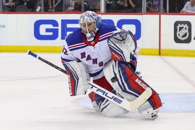 New York Rangers goaltender Jonathan Quick (32) makes a save against the New Jersey Devils during the second period at Prudential Center