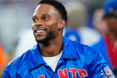 Former New York Giants player, Victor Cruz, is shown before the game against the Dallas Cowboys