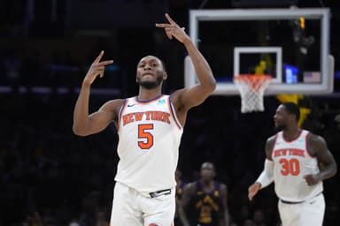 New York Knicks guard Immanuel Quickley (5) celebrates against the Los Angeles Lakers in the second half at Crypto.com Arena