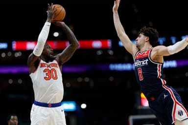 New York Knicks forward Julius Randle (30) shoots the ball over Washington Wizards forward Deni Avdija (8) in the second quarter at Capital One Arena