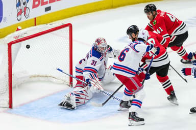 Chicago Blackhawks left wing Nick Foligno (17) scores past New York Rangers goaltender Igor Shesterkin (31) during the third period at the United Center