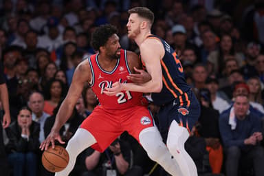 Philadelphia 76ers center Joel Embiid (21) is defended by New York Knicks center Isaiah Hartenstein (55) during the second half during game two of the first round for the 2024 NBA playoffs at Madison Square Garden