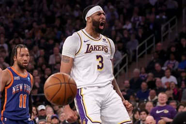 Feb 3, 2024; New York, New York, USA; Los Angeles Lakers forward Anthony Davis (3) reacts after a dunk against New York Knicks guard Jalen Brunson (11) during the first quarter at Madison Square Garden. Mandatory Credit: Brad Penner-USA TODAY Sports