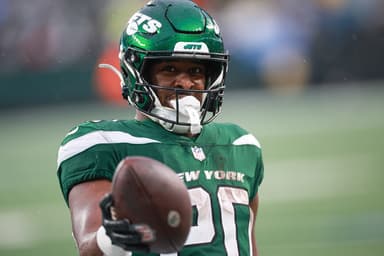 Dec 10, 2023; East Rutherford, New Jersey, USA; New York Jets running back Breece Hall (20) celebrates after a touchdown reception during the second half against the Houston Texans at MetLife Stadium. Mandatory Credit: Vincent Carchietta-USA TODAY Sports