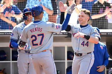 Aug 25, 2024; San Diego, California, USA; New York Mets third baseman Mark Vientos (27) is congratulated by center fielder Harrison Bader (44) after hitting a home run against the San Diego Padres during the seventh inning at Petco Park. Mandatory Credit: Orlando Ramirez-USA TODAY Sports