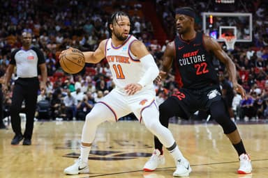 Apr 2, 2024; Miami, Florida, USA; New York Knicks guard Jalen Brunson (11) dribbles the basketball as Miami Heat forward Jimmy Butler (22) defends during the first quarter at Kaseya Center. Mandatory Credit: Sam Navarro-Imagn Images