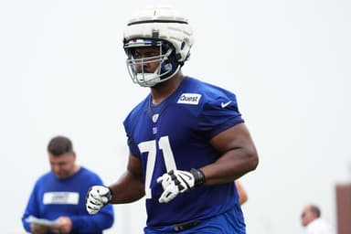 Jul 25, 2024; East Rutherford, NY, USA; New York Giants offensive tackle Marcellus Johnson (71) jogs to the sideline during training camp at Quest Diagnostics Training Center. Mandatory Credit: Lucas Boland-Imagn Images