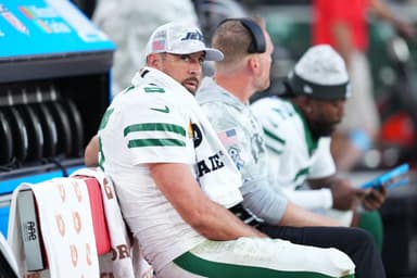 Nov 10, 2024; Glendale, Arizona, USA; New York Jets quarterback Aaron Rodgers (8) looks on against the Arizona Cardinals during the second half at State Farm Stadium. Mandatory Credit: Joe Camporeale-Imagn Images