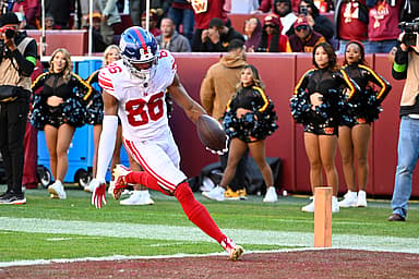 New York Giants wide receiver Darius Slayton (86) scores a touchdown  against the Washington Commanders during the first half at FedExField