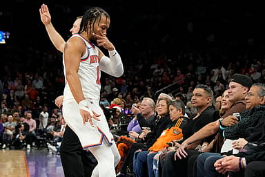 New York Knicks guard Jalen Brunson (11) rects after scoring against the Phoenix Suns in the second half at Footprint Center