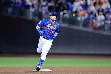 New York Mets catcher Francisco Alvarez (4) rounds the bases after hitting a grand slam home run against the Philadelphia Phillies during the third inning at Citi Field