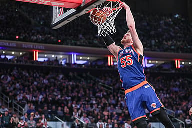 New York Knicks center Isaiah Hartenstein (55) dunks in the fourth quarter against the Brooklyn Nets at Madison Square Garden