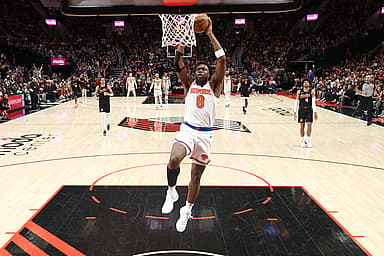 New York Knicks forward OG Anunoby (8) dunks the ball against the Portland Trail Blazers at Moda Center