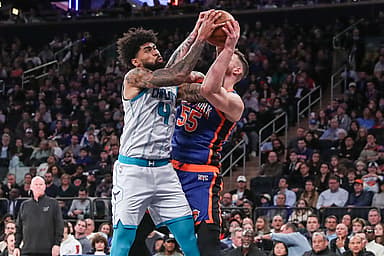 Nov 12, 2023; New York, New York, USA;  Charlotte Hornets center Nick Richards (4) and New York Knicks center Isaiah Hartenstein (55) fight for a rebound in the third quarter at Madison Square Garden. Mandatory Credit: Wendell Cruz-USA TODAY Sports