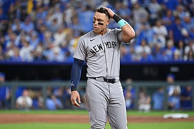 Oct 9, 2024; Kansas City, Missouri, USA; New York Yankees outfielder Aaron Judge (99) reacts in the fifth inning against the Kansas City Royals during game three of the NLDS for the 2024 MLB Playoffs at Kauffman Stadium. Mandatory Credit: Peter Aiken-Imagn Images