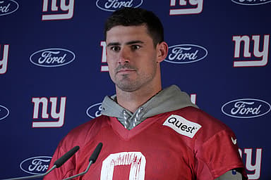 Nov 8, 2024; Munich, Germany; New York Giants quarterback Daniel Jones (8) during press conference at the FC Bayern Munchen training grounds at Sabener Strasse.  Mandatory Credit: Kirby Lee-Imagn Images