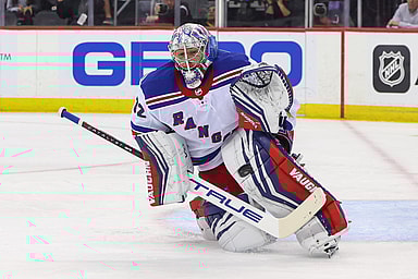 New York Rangers goaltender Jonathan Quick (32) makes a save against the New Jersey Devils during the second period at Prudential Center