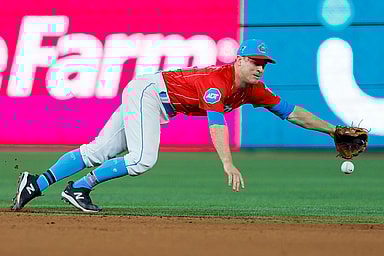 Miami Marlins shortstop Joey Wendle (18) dives but cannot catch a base hit from New York Mets catcher Omar Narvaez (not pictured) during the eighth inning at loanDepot Park
